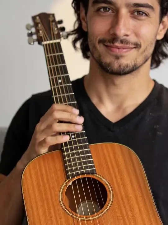 Play Guitar: the preview still the AI Video app shows for this action